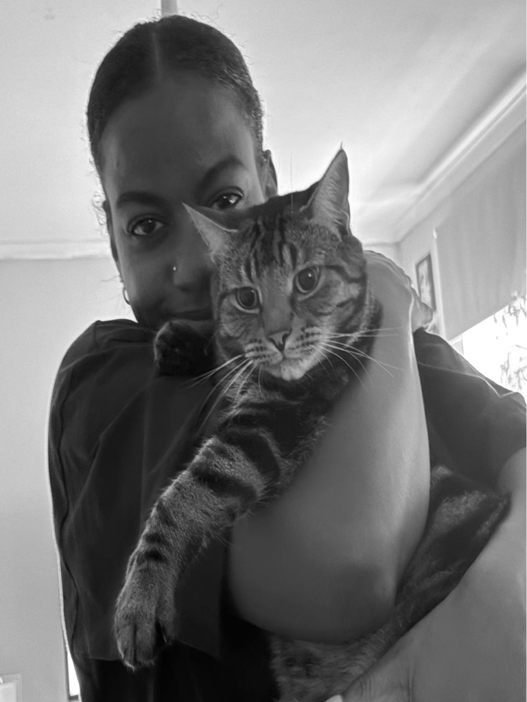 Jayde-Olivia holding a cat